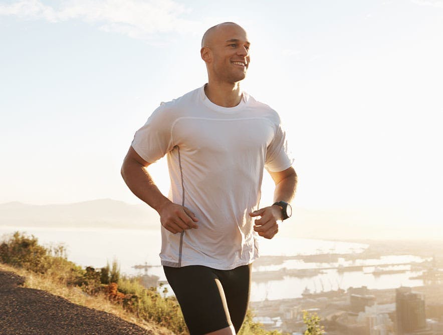 Man running outside after TRT at Genesis Lifestyle Medicine.