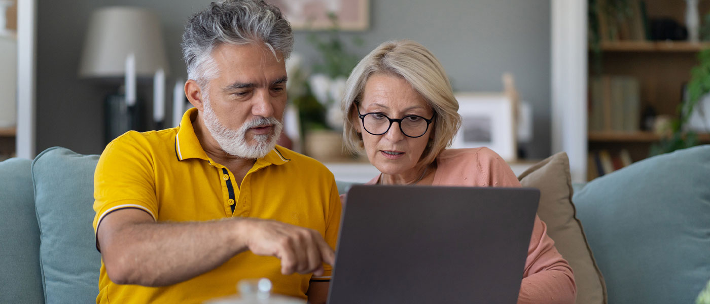 Couple scheduling online consultation at Genesis Lifesytyle Medicine.