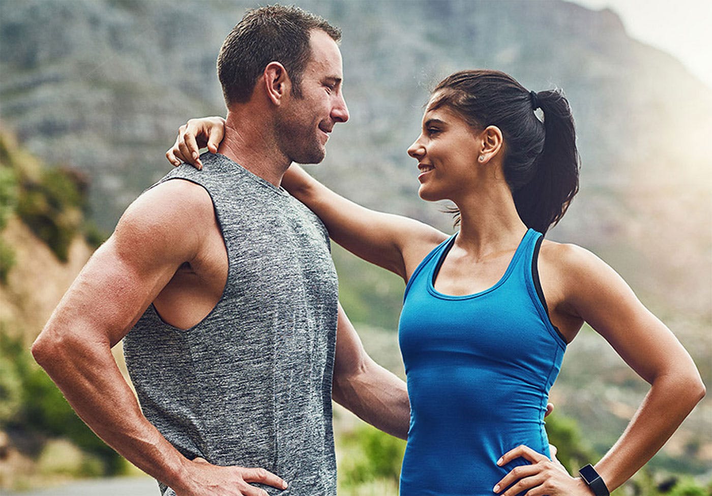 Couple exercising outside after ED treatment at Genesis Lifestyle Medicine.