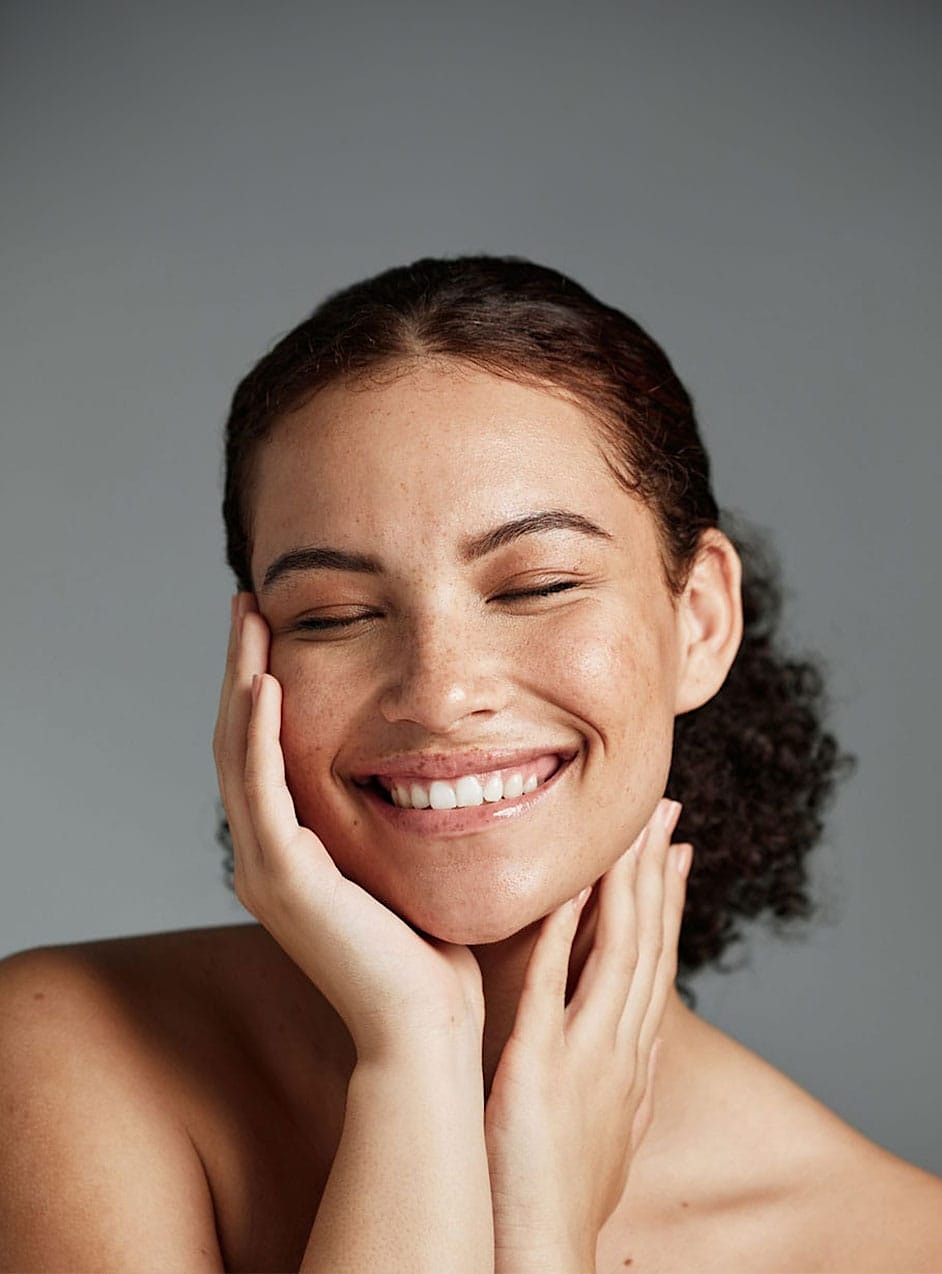 A woman with glowing skin after a vampire facial in Frisco