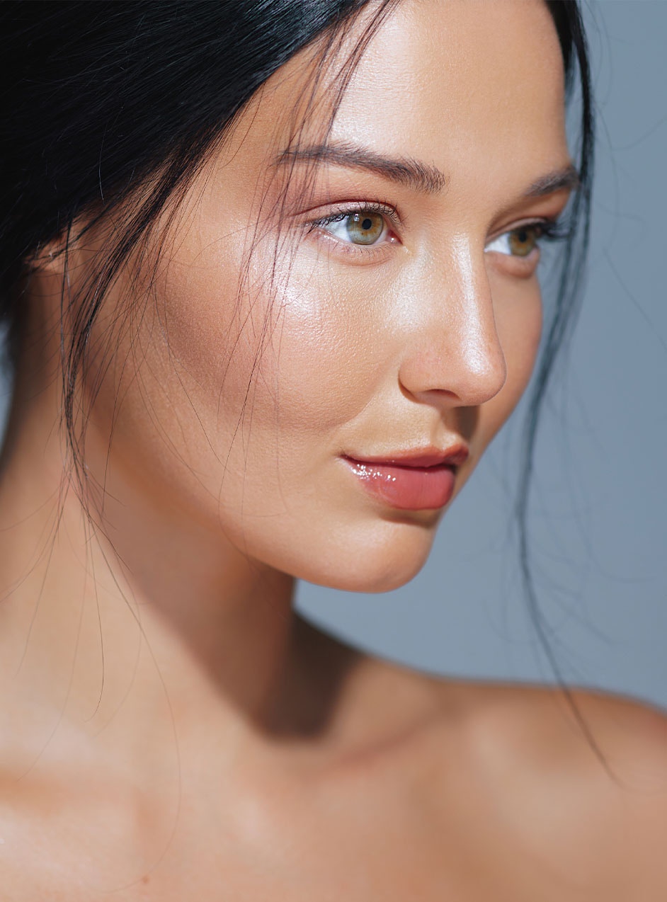 A happy woman after a vampire facial in Fort Worth, TX