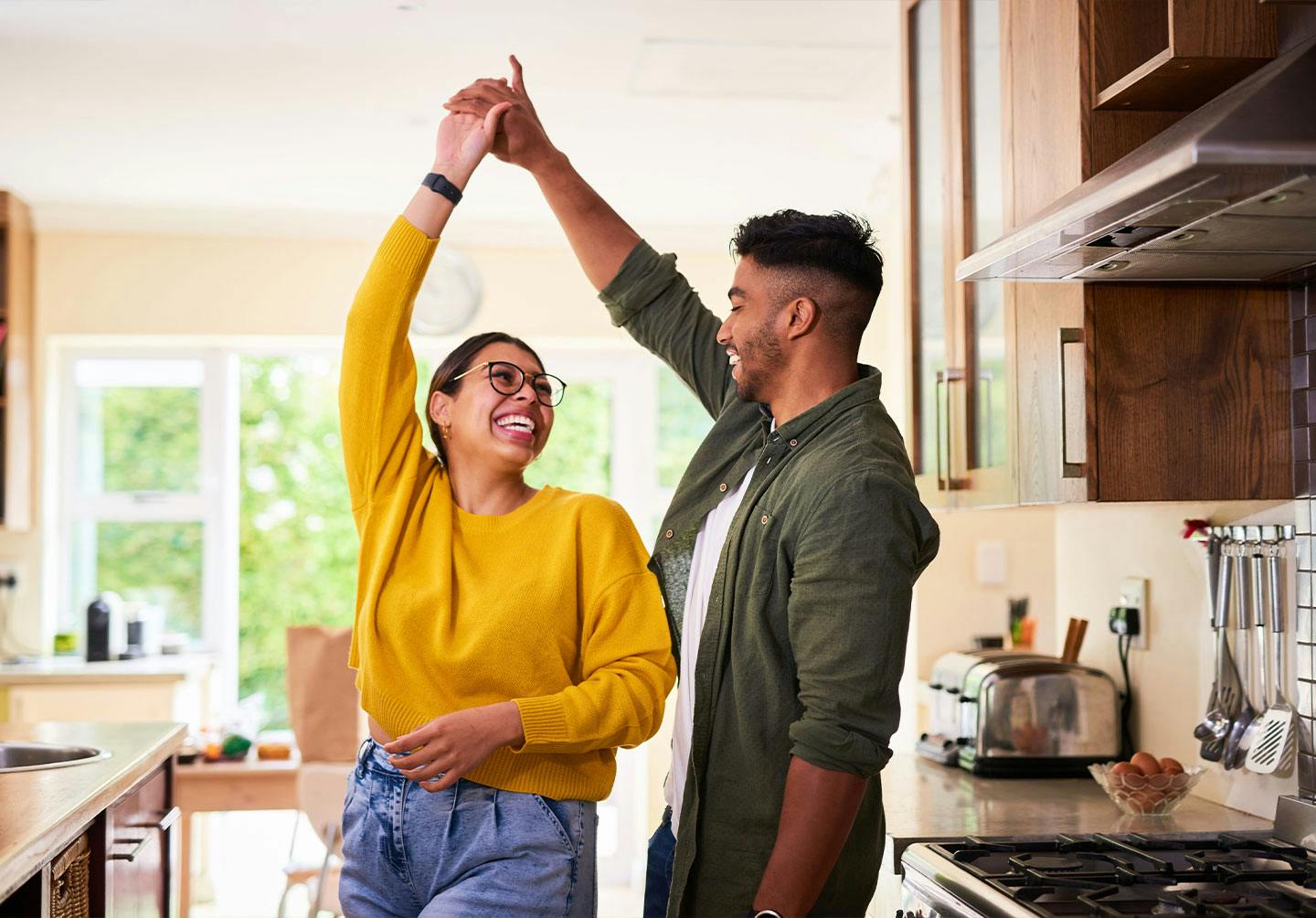 Couple dancing after receiving hormone therapy at Genesis Lifestyle Medicine.
