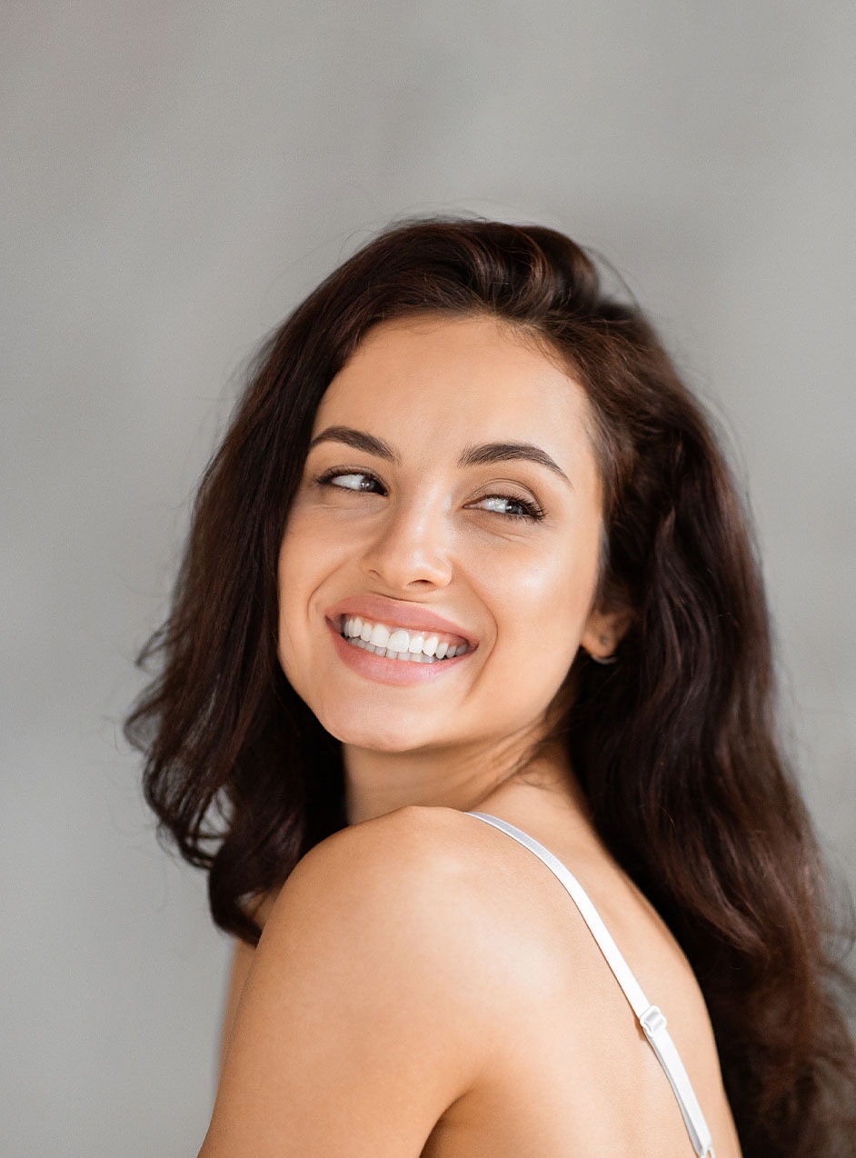 woman smiling with dermal fillers in Longview, TX