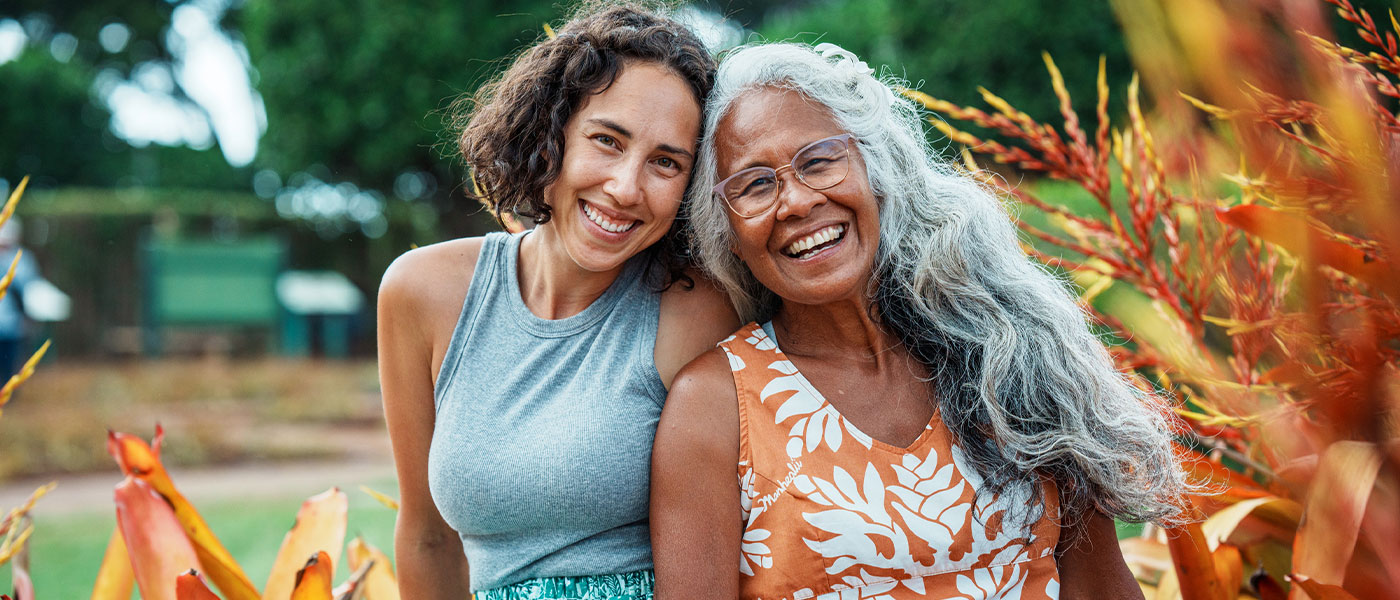 Happy women outside after medical weight loss program from Genesis Lifestyle Medicine.