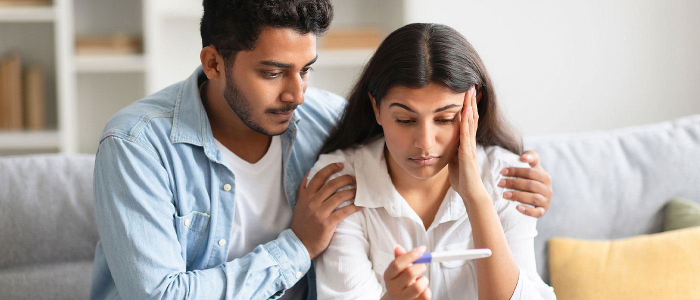 Couple concerned with ED, considering treatment from Genesis Lifestyle Medicine.