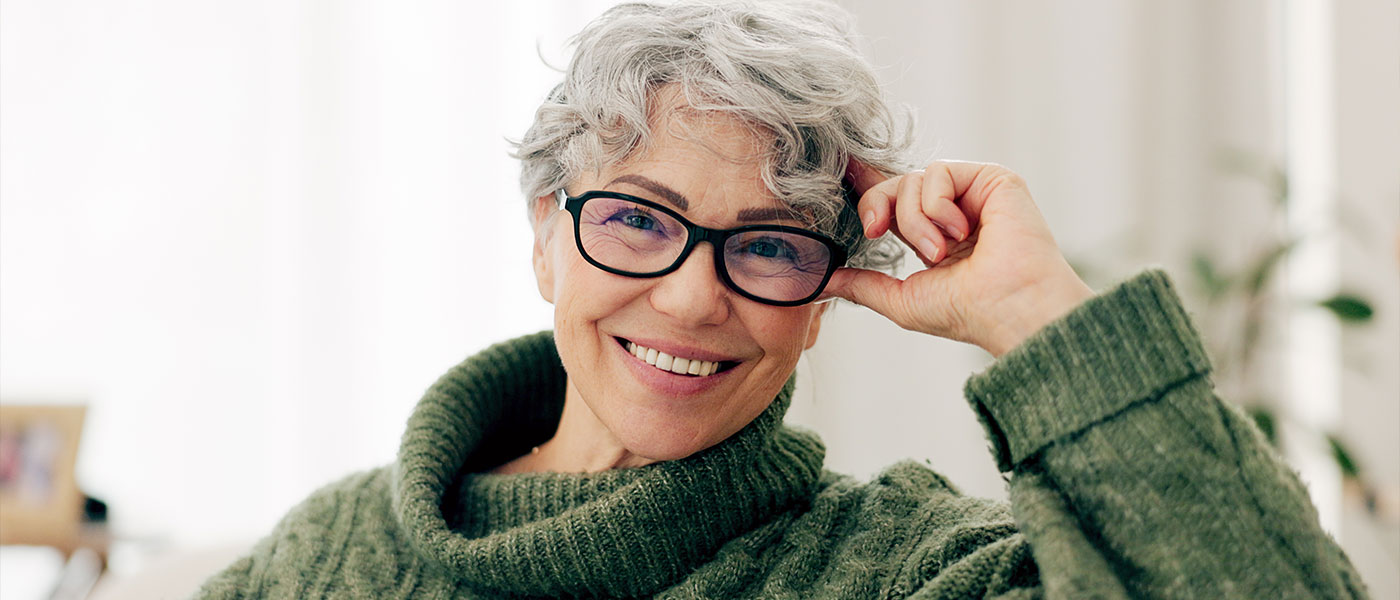 Smiling woman after receiving HRT at Genesis Lifestyle Medicine.