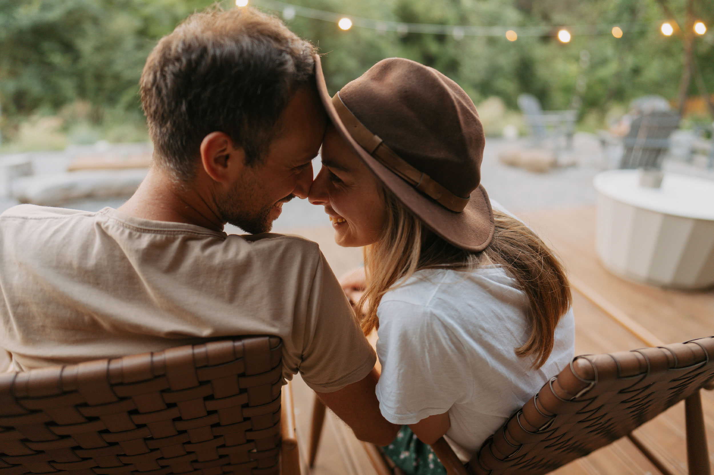 Couple smiling and cuddling post-treatment with P-Long therapy from Genesis Lifestyle Medicine.
