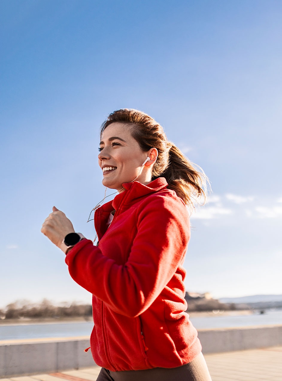 woman jogging after Sermorelin treatment in Dallas, TX