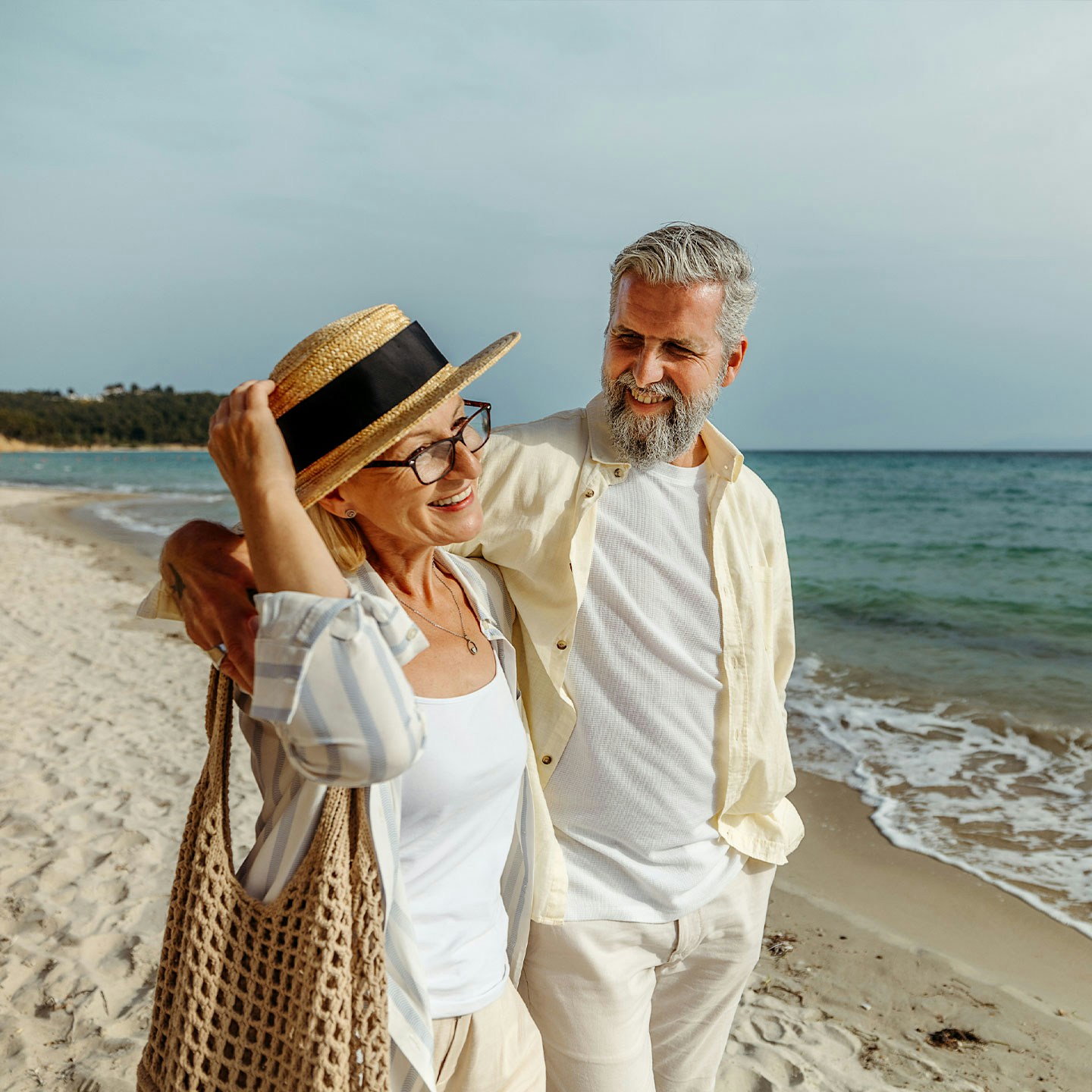 older healthy couple walking on the beach after Methylene Blue treatment in Franklin, TN