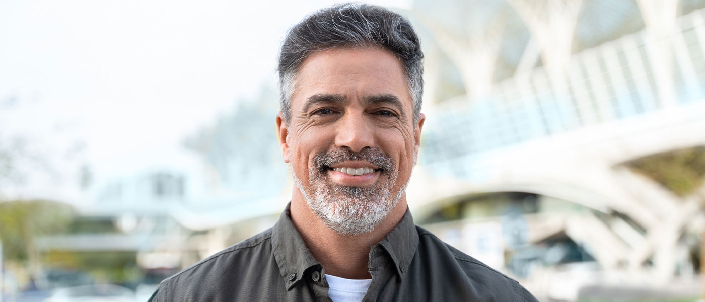 Confident man looking sharp and self-assured following P-Shot Genesis Lifestyle Medicine therapy.