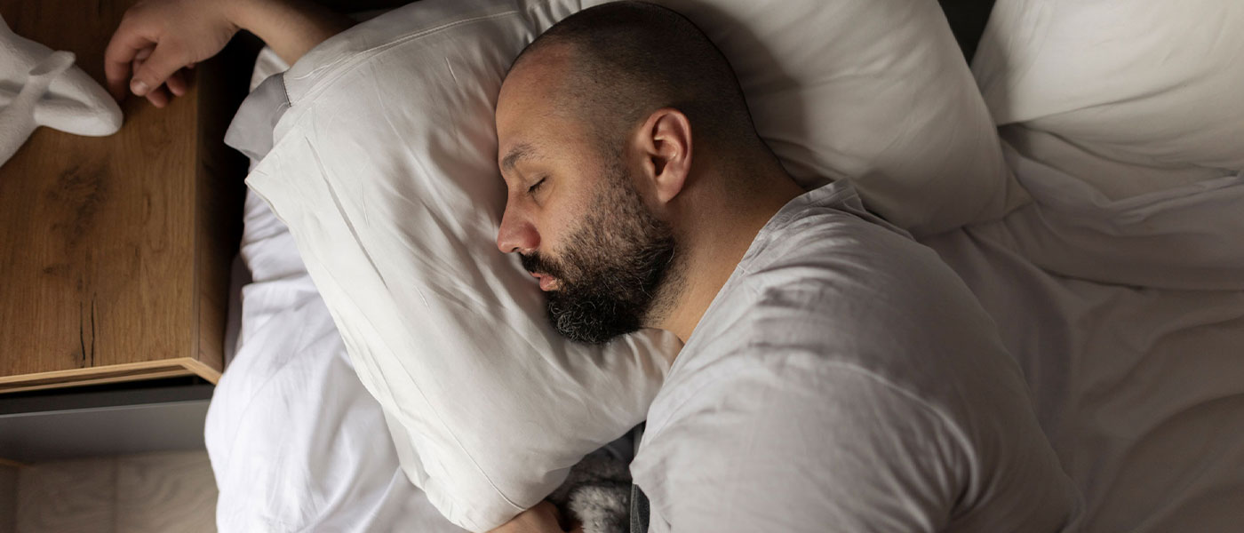 man sleeping after taking sermorelin