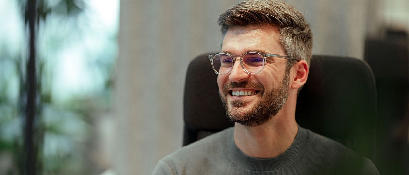 man smiling at his P-Long treatment appointment