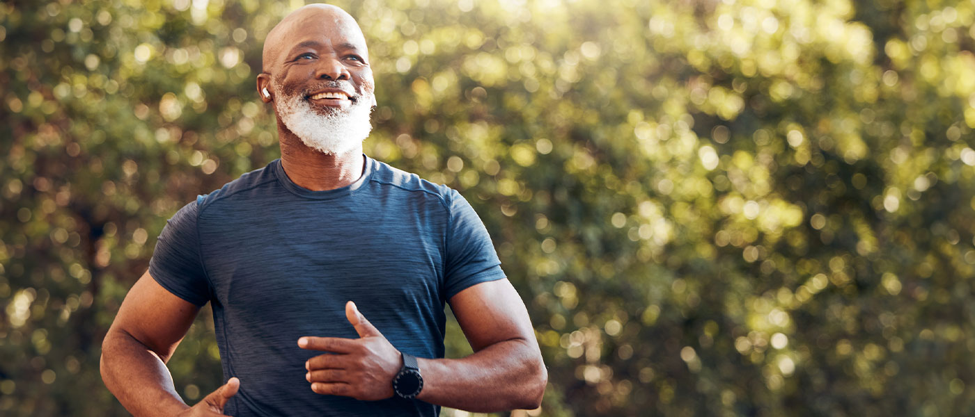 older man running outside after getting P-Long treatment