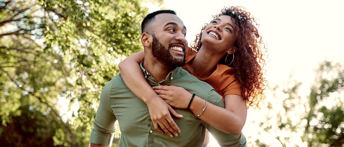 happy couple hugging after starting P-Long treatment