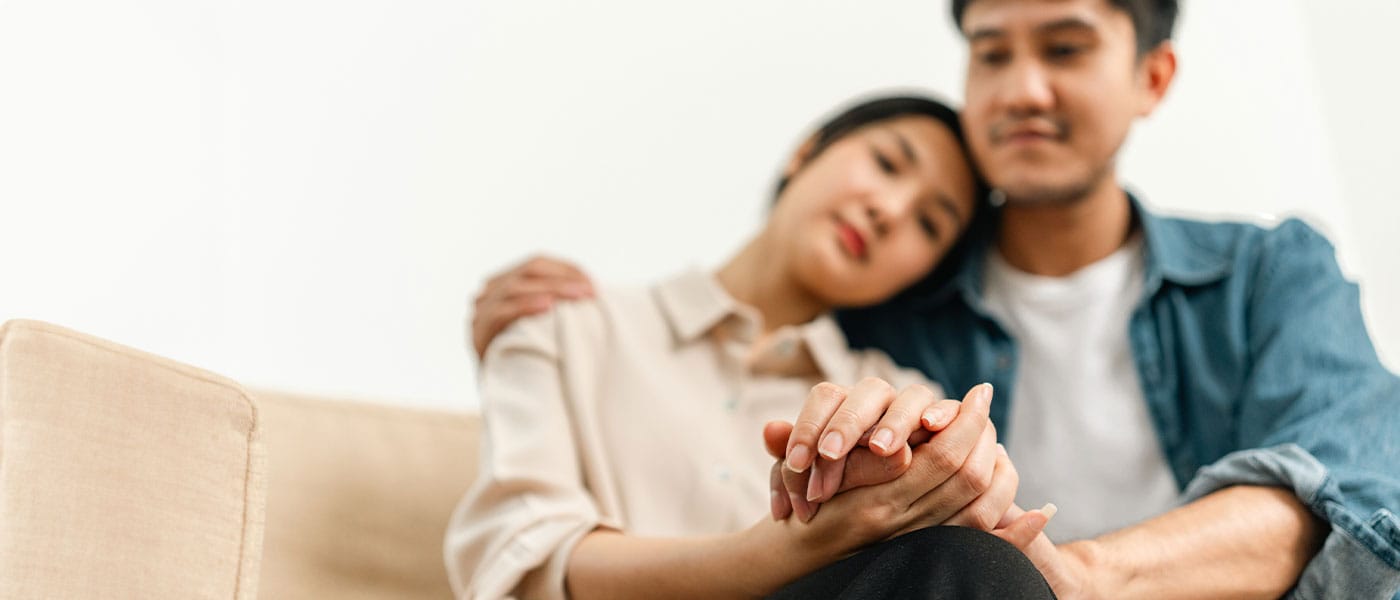couple holding hands after starting P-Long treatment