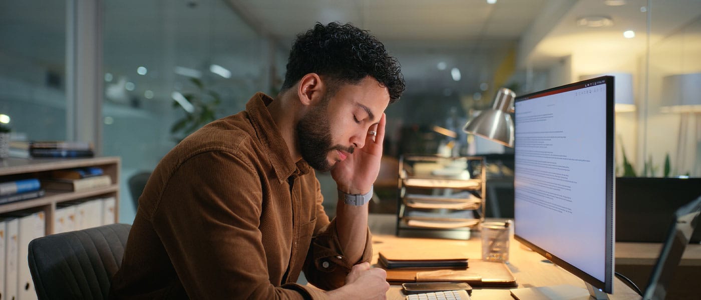 man with a migraine before starting NAD+ therapy