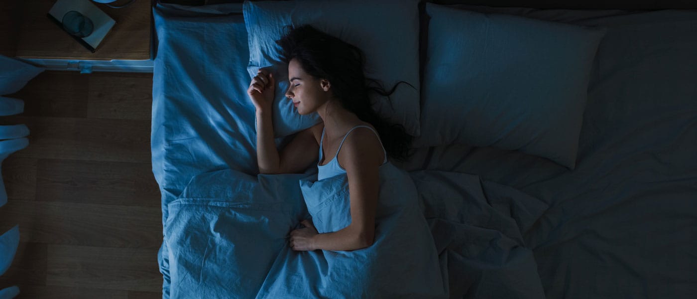woman sleeping after starting sermorelin therapy