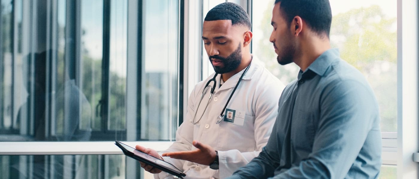 man discussing the P-Shot with his doctor