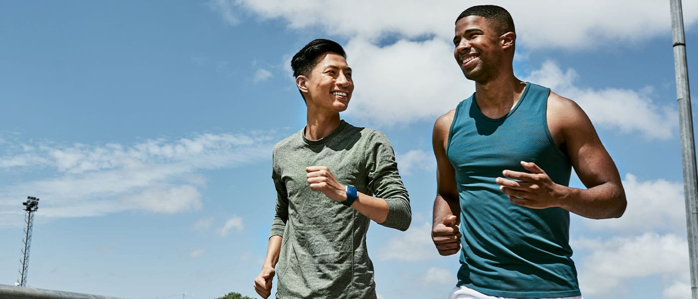 two men running together after getting the P-Shot