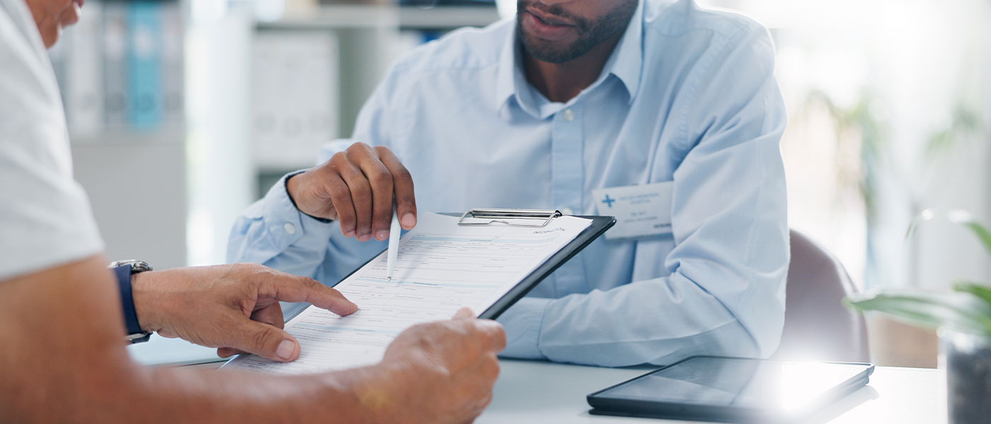 man discussing his next P-Shot with his doctor