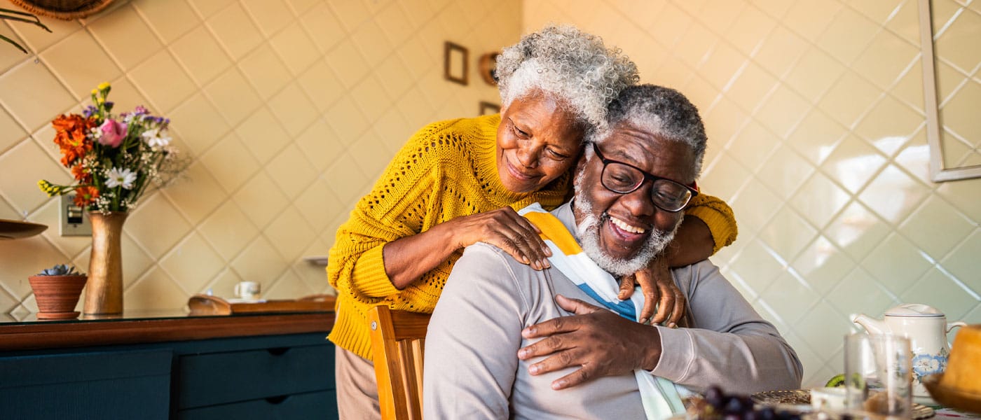 older couple hugging after starting P-Long treatment