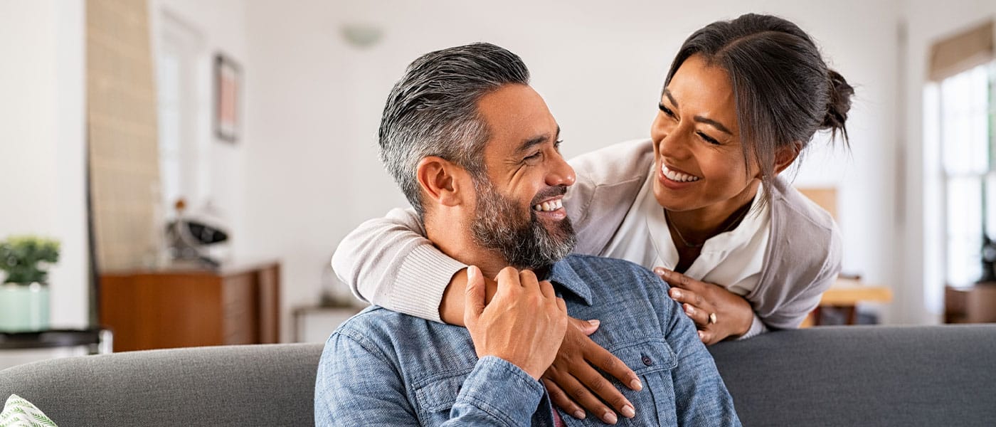 happy man and woman after he starts testosterone therapy
