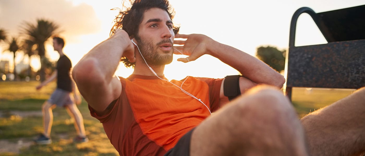 man doing a core workout after starting testosterone therapy