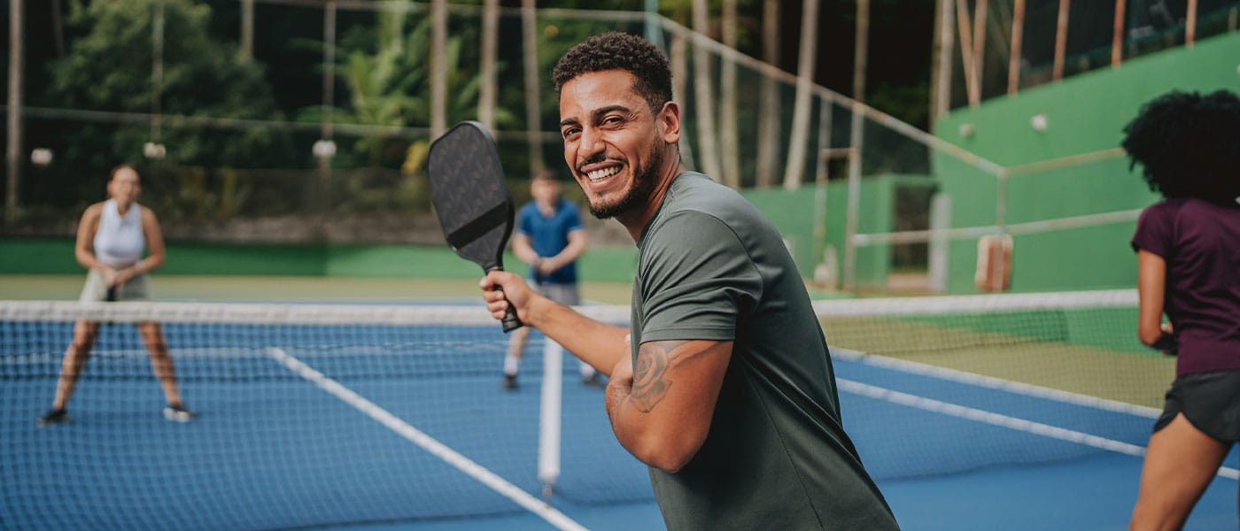 man playing pickleball after starting testosterone therapy