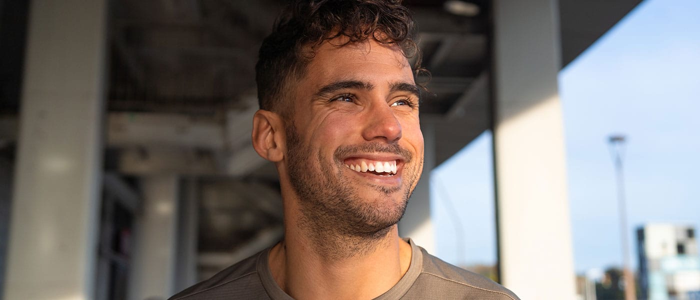 man happy outside after starting testosterone therapy