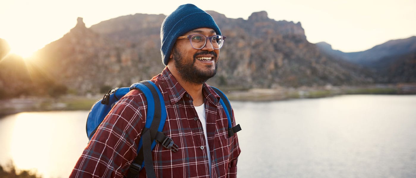 happy man hiking after starting testosterone therapy