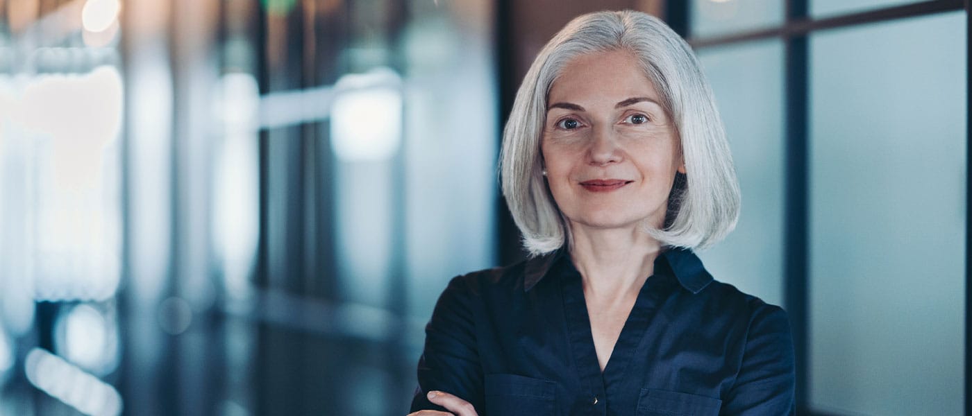 older healthy woman after starting hormone therapy for menopause