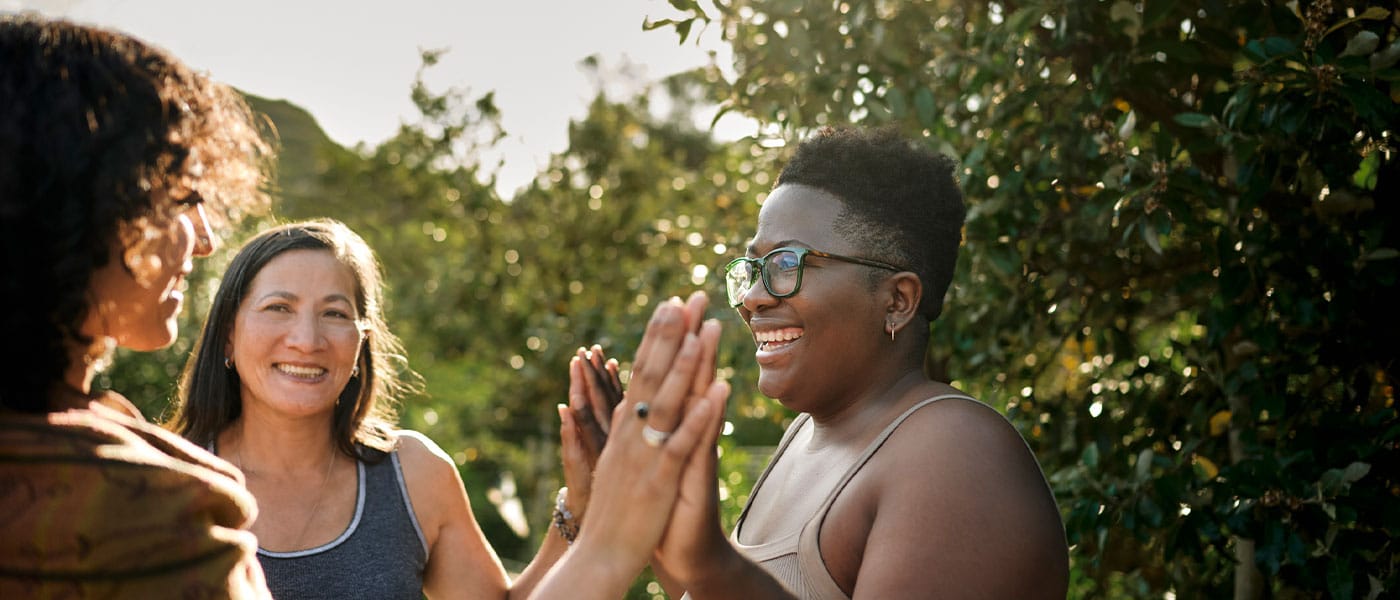 women happy and smiling after starting hormone therapy
