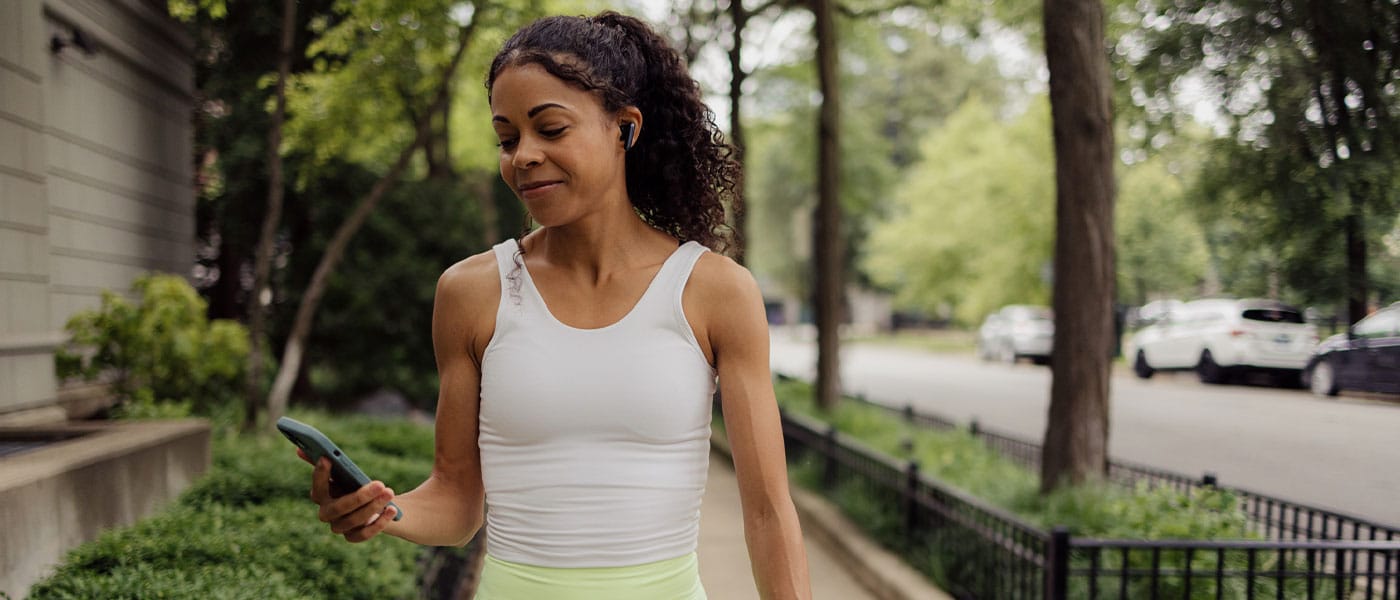 woman walking outside after starting sermorelin therapy