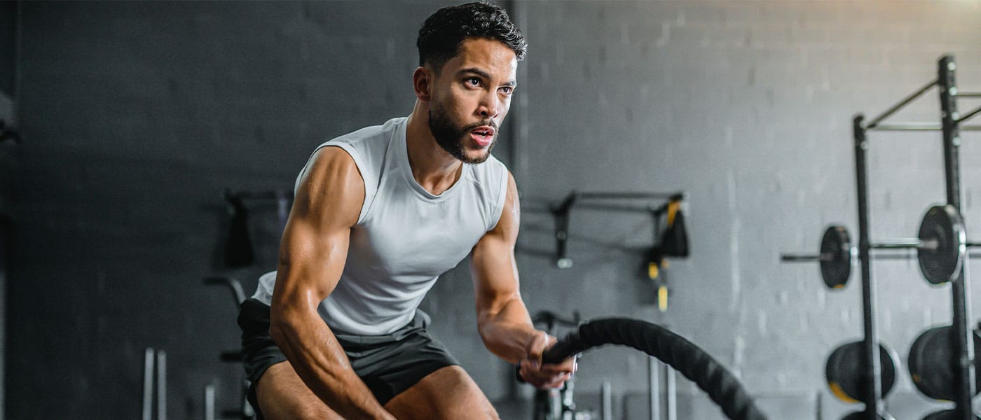 muscular man working out after starting testosterone therapy