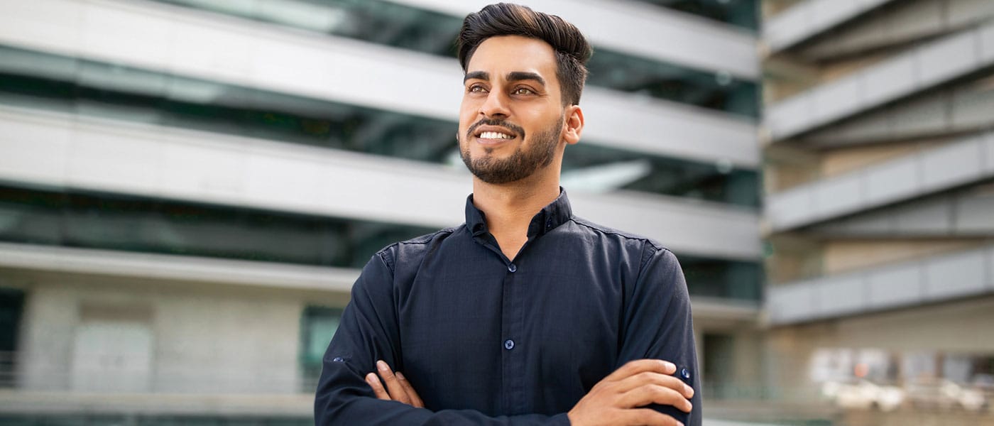 man smiling after starting testosterone therapy