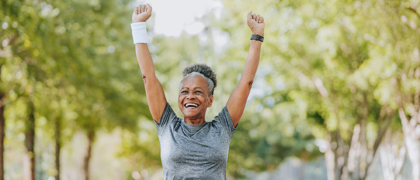 older woman walking outside after starting hormone therapy