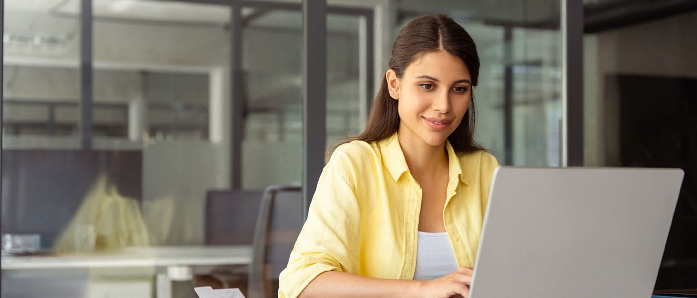 woman focused on work after starting NAD therapy