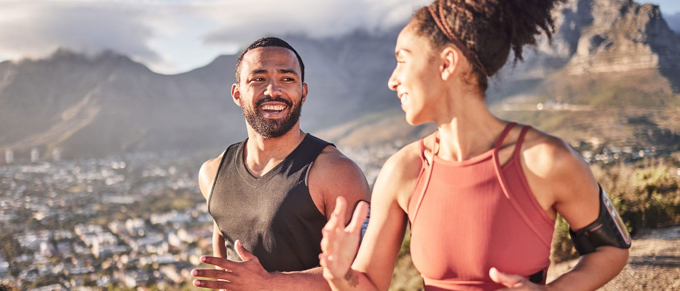 couple running outside together after starting NAD therapy