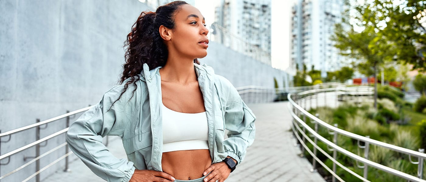 woman running outside after starting NAD therapy