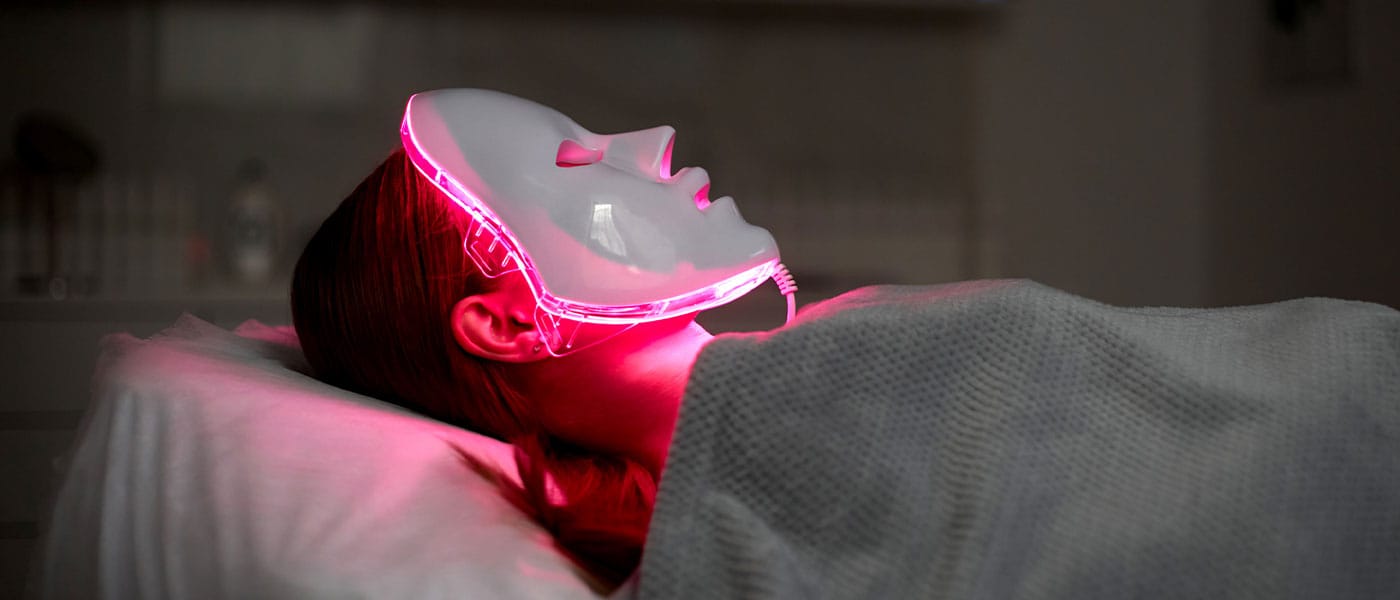 woman getting red light therapy after starting NAD therapy