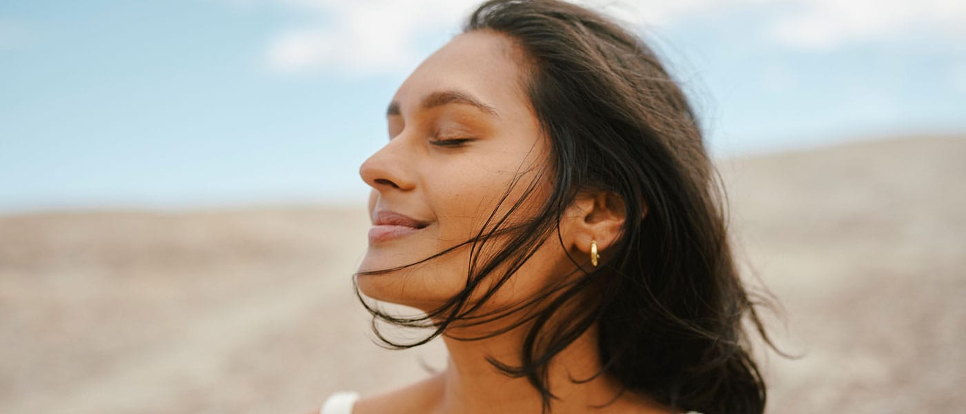 woman feeling peaceful after starting sermorelin therapy