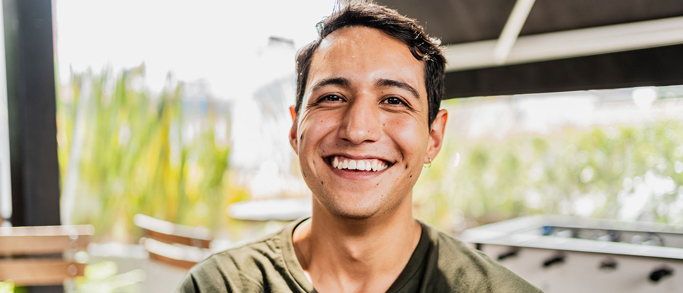 man smiling after starting sermorelin therapy