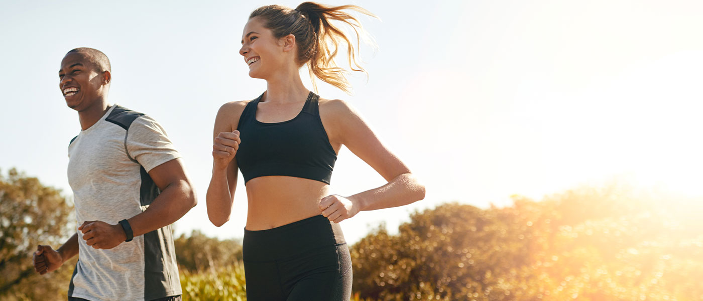 couple running together outside after starting sermorelin therapy