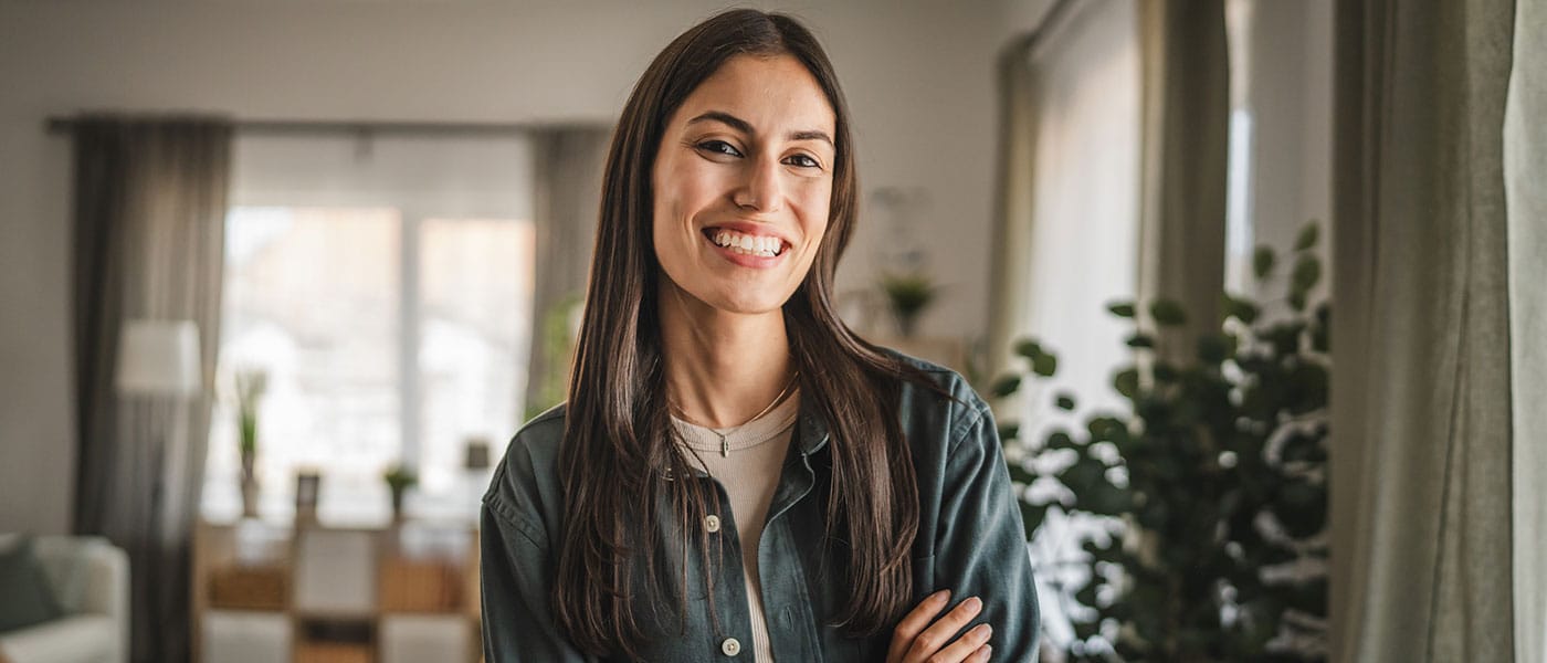 woman smiling after starting sermorelin therapy
