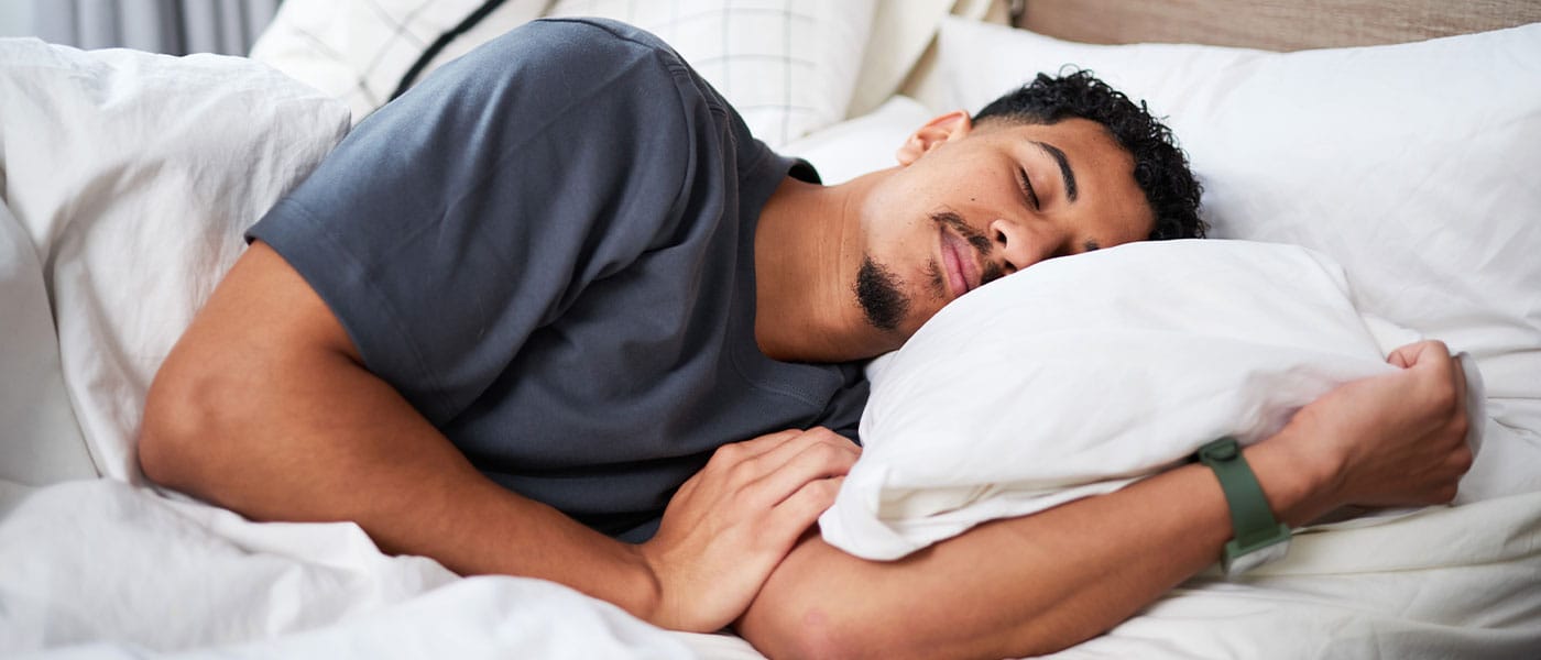 man getting quality sleep after starting testosterone therapy