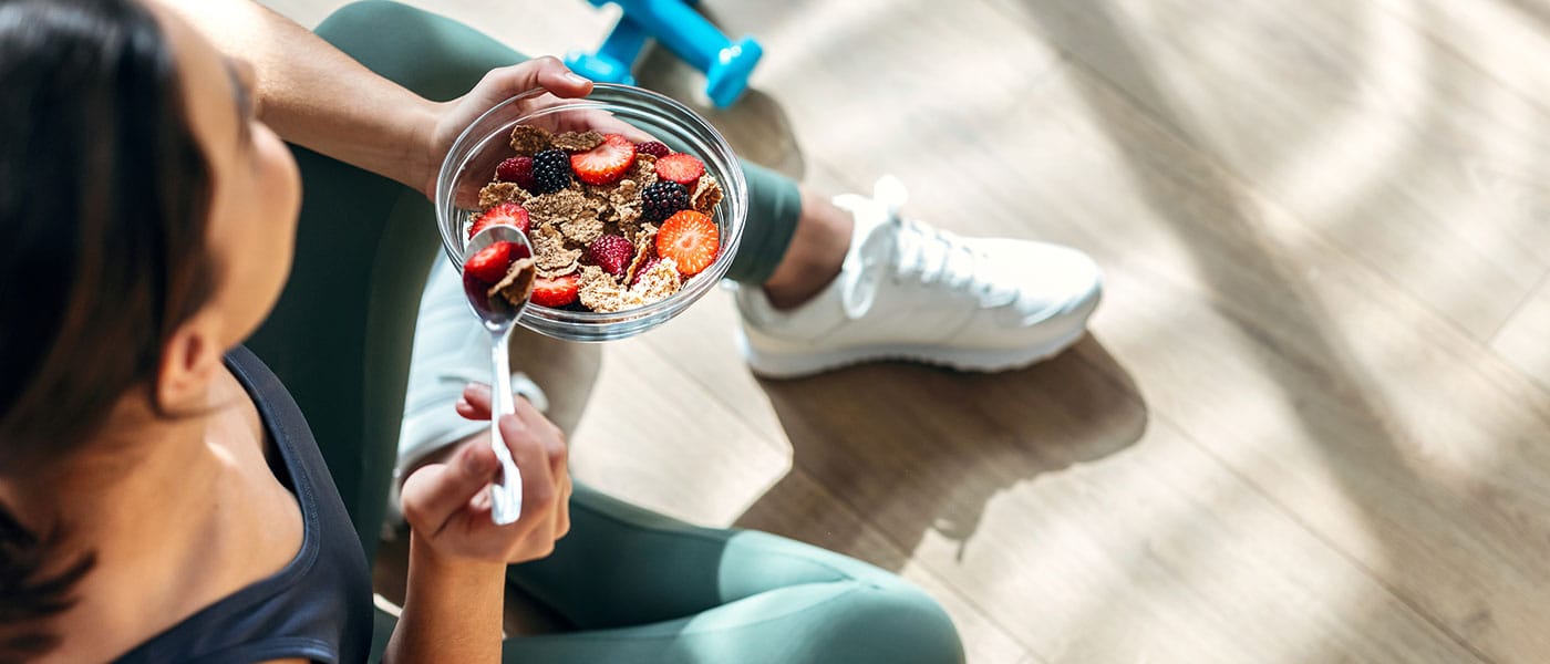 woman eating healthy after starting hormone therapy