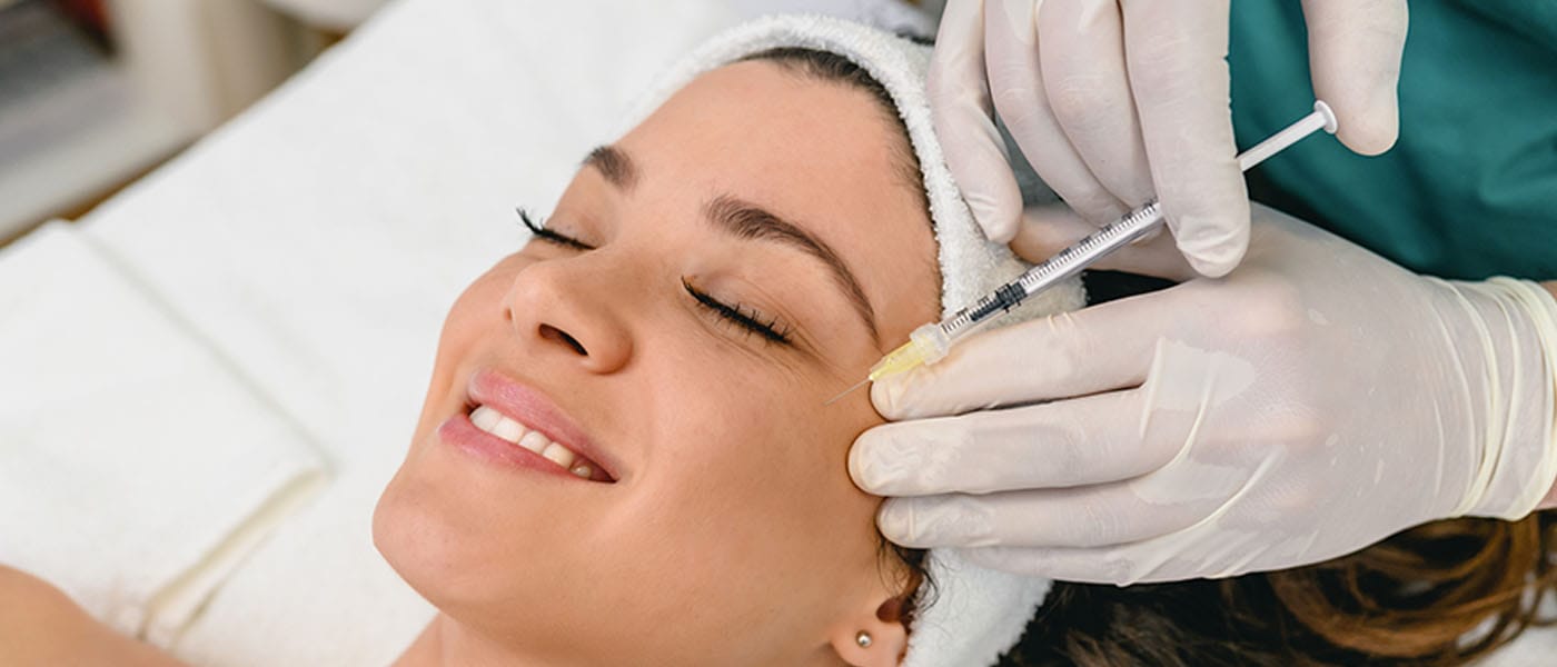 woman getting preventative botox