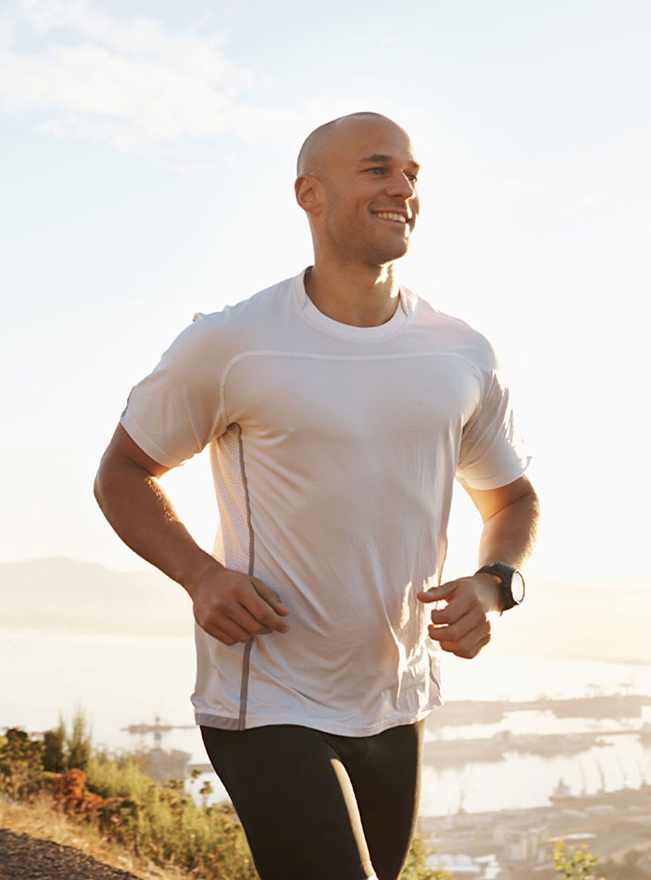 healthy man jogging after medical weight loss in Indianapolis, IN
