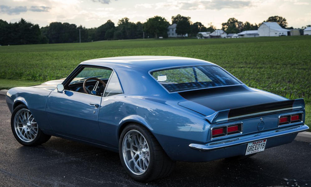 1968 Camaro featuring original style seating with a SPORT-X Hounds-tooth design. Includes matching door panels and center console.