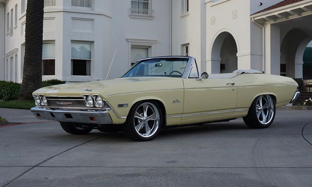 1968 Chevelle Malibu featuring Universal Pro Series Low Back seats with SPORT design in black vinyl and white contrast stitching. Includes matching rear seat and door panels.